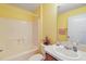 Bathroom with a shower/tub combo, sink, and toilet at 3325 Reston Dr, The Villages, FL 32162