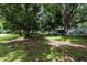 Private backyard with lush greenery at 104 Fruitwood Ave, Eustis, FL 32726