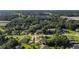 Aerial view of neighborhood showcasing various houses and landscape at 24126 Plymouth Hollow Cir, Sorrento, FL 32776
