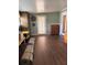 Spacious Florida room with wood flooring and ample storage at 34323 Island Dr, Leesburg, FL 34788