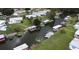 Aerial view of canal-front community and homes at 34323 Island Dr, Leesburg, FL 34788