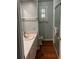 Bathroom with a shower, toilet and vanity at 34323 Island Dr, Leesburg, FL 34788