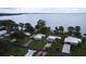 Aerial view of community with lakefront properties at 34323 Island Dr, Leesburg, FL 34788