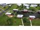 Aerial view showing home and canal-side location at 34323 Island Dr, Leesburg, FL 34788