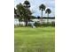 Peaceful lakefront property featuring a gazebo and dock, perfect for relaxation at 104 Turtle Run, Umatilla, FL 32784
