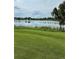Serene view of a tranquil lake with lush greenery at 104 Turtle Run, Umatilla, FL 32784