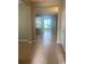 Bright entryway with tile flooring leading to the living areas at 326 Silver Maple Rd, Groveland, FL 34736