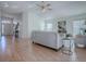 Light and airy living room with hardwood floors and plenty of natural light at 1302 Oporto Dr, The Villages, FL 32162