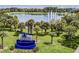 Aerial view of Tavares's waterfront area with fountains at 27637 Lisa Dr, Tavares, FL 32778