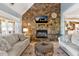 Spacious living room with stone fireplace and high ceilings at 39400 French Rd, Lady Lake, FL 32159