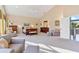 Main bedroom with high ceilings, large windows and access to a balcony at 39400 French Rd, Lady Lake, FL 32159