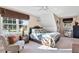 Cozy bedroom with a queen-size bed and plenty of natural light at 39400 French Rd, Lady Lake, FL 32159