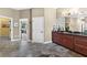 Bathroom with double vanity and access to additional rooms at 39400 French Rd, Lady Lake, FL 32159