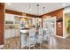 Spacious kitchen with white cabinets, granite countertops, and stainless steel appliances at 39400 French Rd, Lady Lake, FL 32159