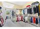 Large walk-in closet with ample shelving and hanging space at 39400 French Rd, Lady Lake, FL 32159