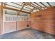 Clean and well-maintained horse stall with wooden walls and flooring at 39400 French Rd, Lady Lake, FL 32159