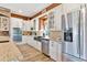 Large kitchen with granite countertops, white cabinets, and a farmhouse sink at 39400 French Rd, Lady Lake, FL 32159