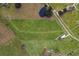 Aerial view of property highlighting a large lot and a pond at 39400 French Rd, Lady Lake, FL 32159