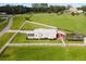 An aerial view of the property showing the home and surrounding land at 39400 French Rd, Lady Lake, FL 32159