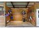 Organized storage area with shelves and hooks for tools and equipment at 39400 French Rd, Lady Lake, FL 32159