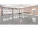 Large garage with double doors and epoxy flooring at 39400 French Rd, Lady Lake, FL 32159