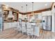 Modern kitchen with granite countertops, white cabinets, and a large island at 39400 French Rd, Lady Lake, FL 32159