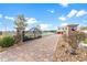 Ornate gate and brick driveway leading to the house at 39400 French Rd, Lady Lake, FL 32159