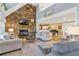 Spacious living room with stone fireplace and high ceilings at 39400 French Rd, Lady Lake, FL 32159