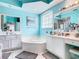 Bathroom with double vanity, soaking tub, and separate shower at 139 Belfry Dr, Davenport, FL 33897