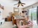 Bedroom with wooden bed frame and access to patio at 139 Belfry Dr, Davenport, FL 33897