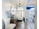 Bright entryway with tiled flooring, a console table, and chair at 139 Belfry Dr, Davenport, FL 33897