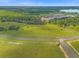 Aerial view of a large lot with lake access at 38530 Wooded Meadow Drive, Umatilla, FL 32784