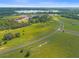 Aerial view of large lot with lake access at 38530 Wooded Meadow Drive, Umatilla, FL 32784