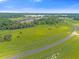 Aerial view of a large lot with lake access, perfect for building a dream home at 38530 Wooded Meadow Drive, Umatilla, FL 32784