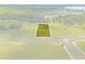 Aerial lot view of property near lake and roads at 38530 Wooded Meadow Drive, Umatilla, FL 32784
