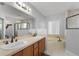 Bathroom boasts dual sinks, a soaking tub, and a shower at 27637 Lisa Dr, Tavares, FL 32778