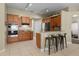 Spacious kitchen with stainless steel appliances and an island with seating at 27637 Lisa Dr, Tavares, FL 32778
