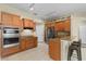 Kitchen with stainless steel appliances and granite countertops at 27637 Lisa Dr, Tavares, FL 32778