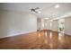 Bright living room with hardwood floors, high ceilings and ceiling fan at 4907 Tara View Rd, Leesburg, FL 34748