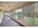 Spacious sunroom with ample natural light and backyard view at 4907 Tara View Rd, Leesburg, FL 34748