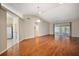 Spacious living room with hardwood floors and sliding doors at 4907 Tara View Rd, Leesburg, FL 34748