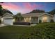 Charming single-story home with attached garage at 4907 Tara View Rd, Leesburg, FL 34748