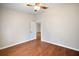 Bedroom with hardwood floors and ceiling fan at 4907 Tara View Rd, Leesburg, FL 34748
