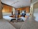 Modern kitchen featuring stainless steel appliances and a breakfast bar at 36641 Tropical Wind Ln, Grand Island, FL 32735