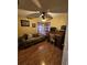 Home office with wood floors and built-in desk at 36641 Tropical Wind Ln, Grand Island, FL 32735