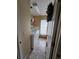 Laundry room with washer, dryer, and shelving at 36641 Tropical Wind Ln, Grand Island, FL 32735