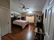 Spacious bedroom with wood floors and ample closet space at 36641 Tropical Wind Ln, Grand Island, FL 32735