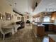Open kitchen with breakfast bar and tile flooring at 36641 Tropical Wind Ln, Grand Island, FL 32735