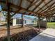 Covered carport with access to the backyard at 11450 Lakeview Dr, Leesburg, FL 34788