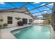 Inviting screened pool and patio; great for entertaining at 30549 Pga Dr, Sorrento, FL 32776